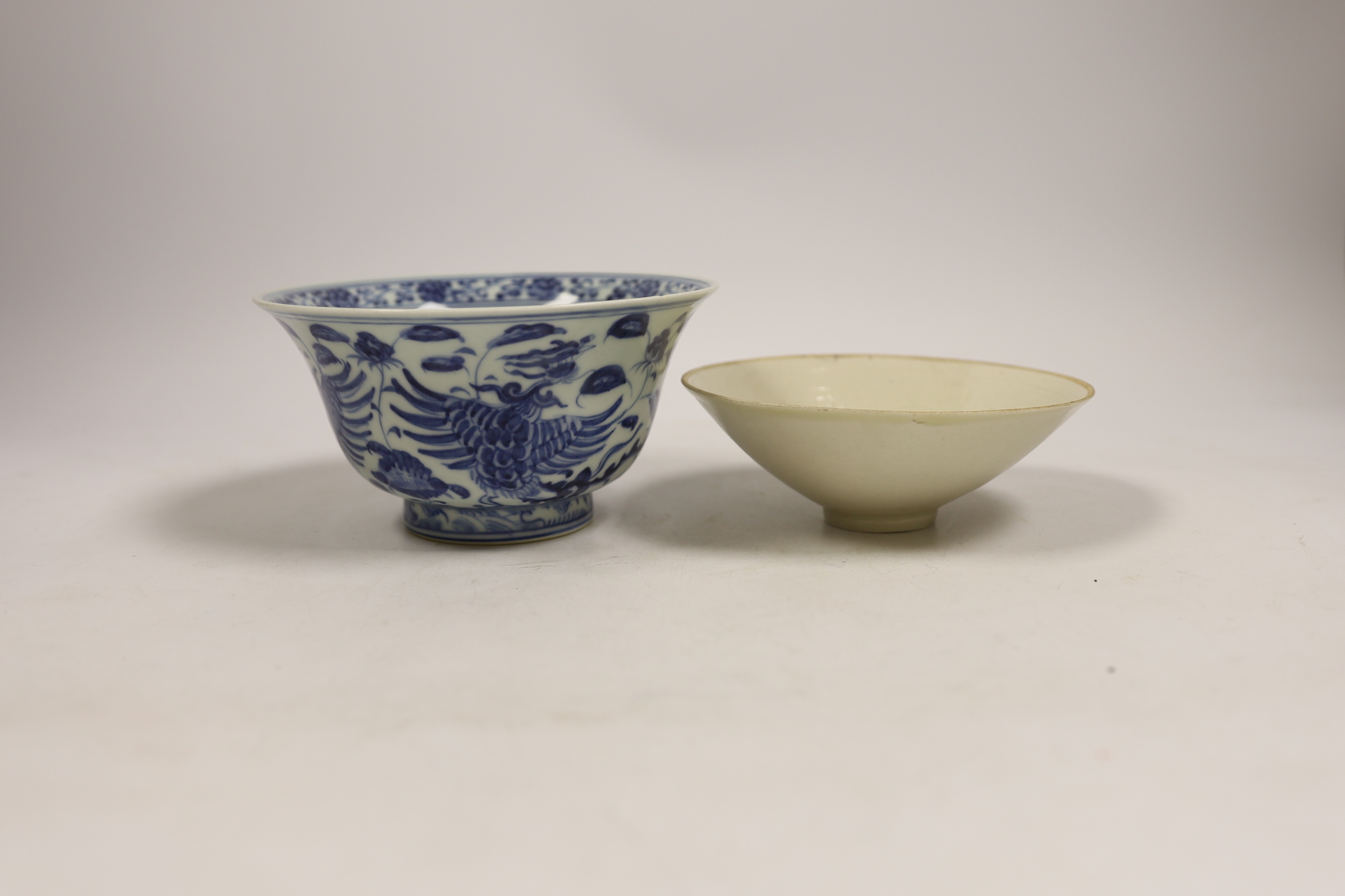 A Chinese blue and white porcelain bowl, Xuande mark but later and another bowl